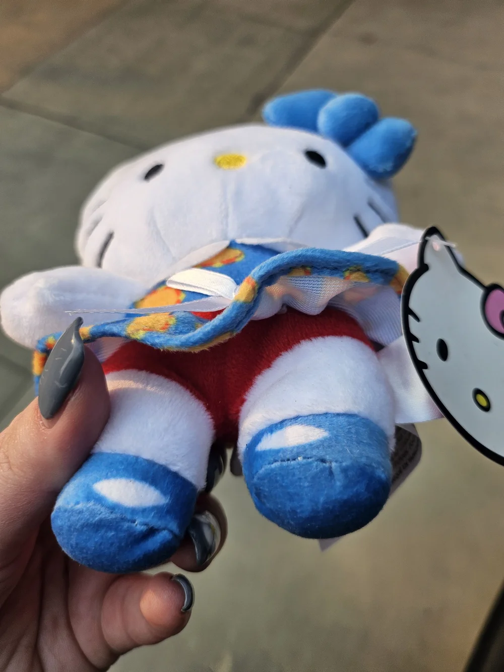 Sanrio Hello Kitty White Plush with Blue Bow and Multicolor Dress
